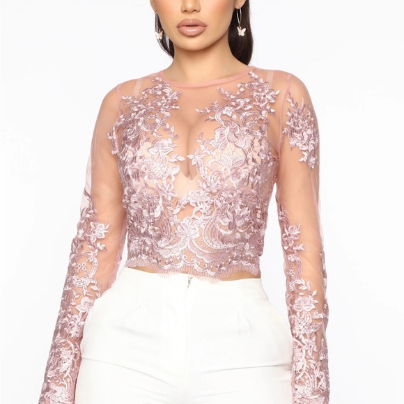 Women’s lace top, zips up at the back and is a bit cropped. - Picture 1 of 2